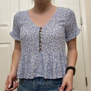 Tilly’s blue floral blouse
